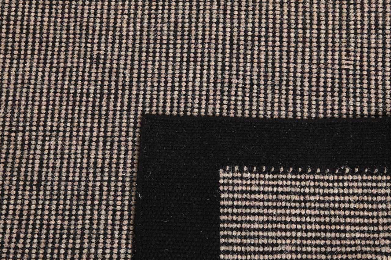 Tappeto Jensen Black/Grey – Lana e Cotone Intrecciati a Mano con Bordo Nero
